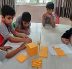 4th August,2023- Students of Grade II explored addition through blocks.